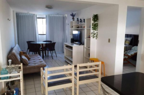 Apartamento azul no condomínio Mar de Cotovelo